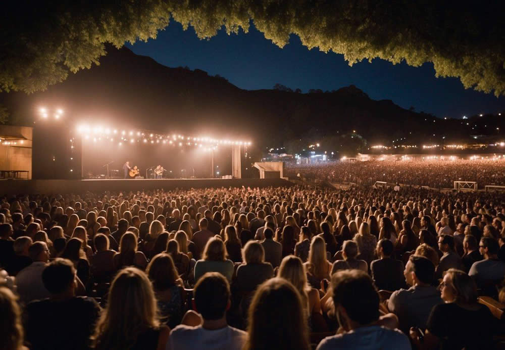 A lively crowd gathers under the twinkling lights of an outdoor amphitheater, as musicians and performers take the stage for a night of music and live entertainment in San Diego